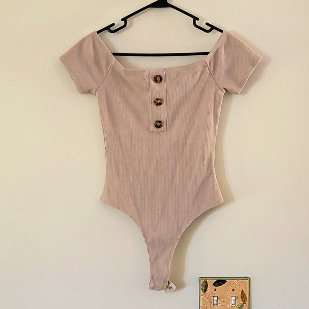 Bodysuit Super cute Orange kiss size M beige/tan ribbed body suit. No flaws.